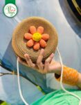 Handcrafted Round Straw Sling Bag with Smiley Flower